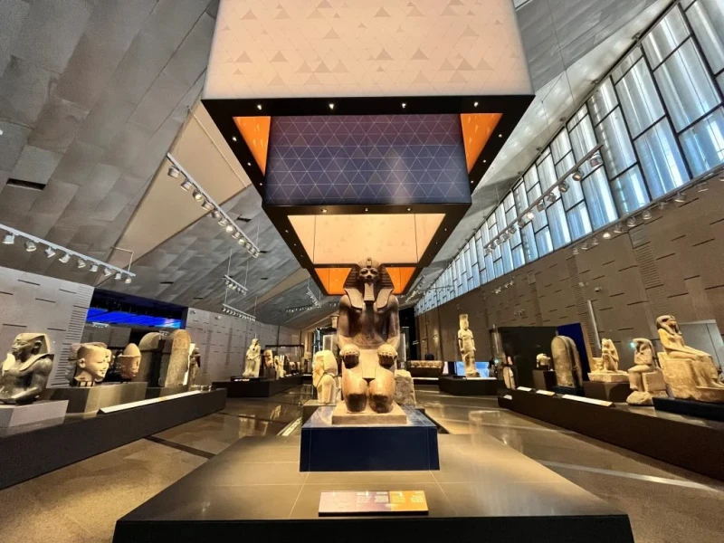 Ancient Egyptian artifacts displayed inside Grand Egyptian Museum