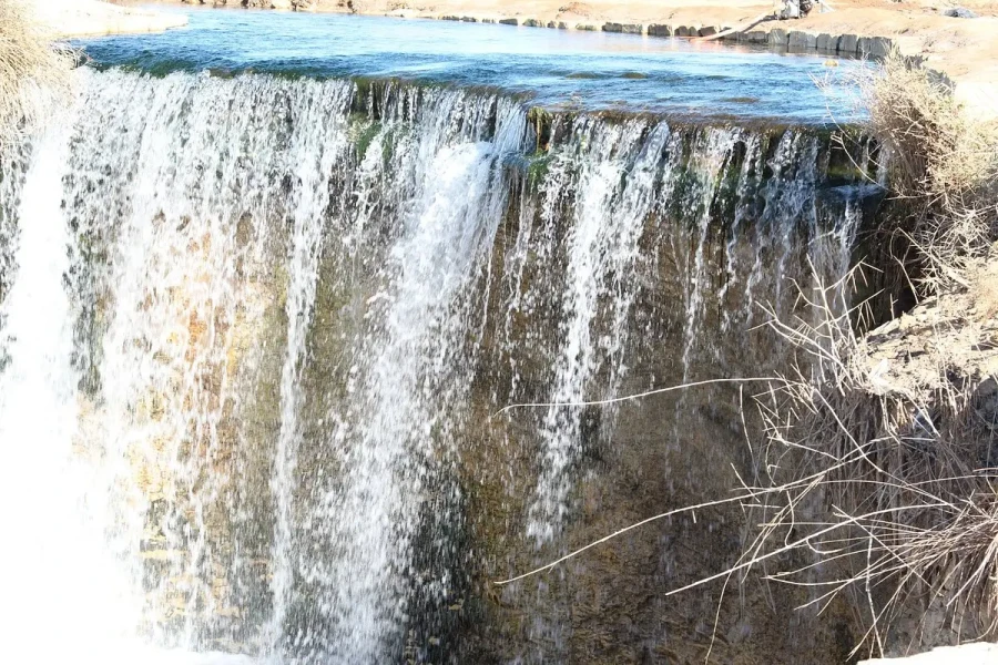 Wadi El Rayan waterfalls and desert landscape in Egypt.