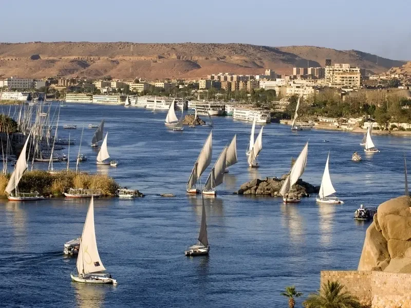 Wooden felucca boat with Cairo skyline