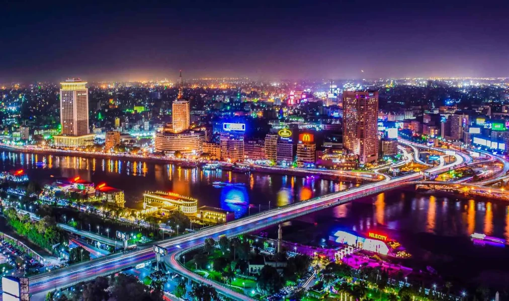 Cairo skyline glowing with city lights at night
