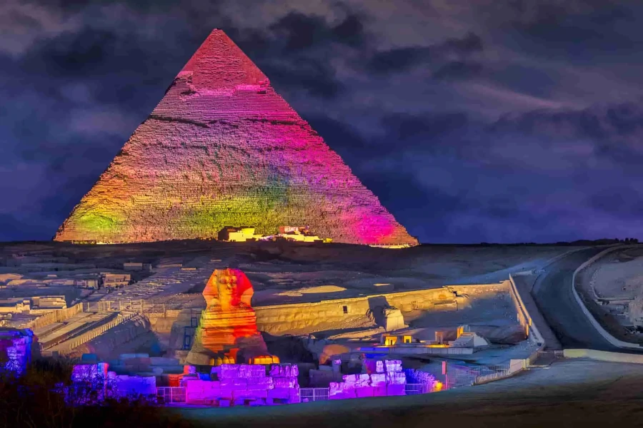 Giza Pyramids glowing with night projections